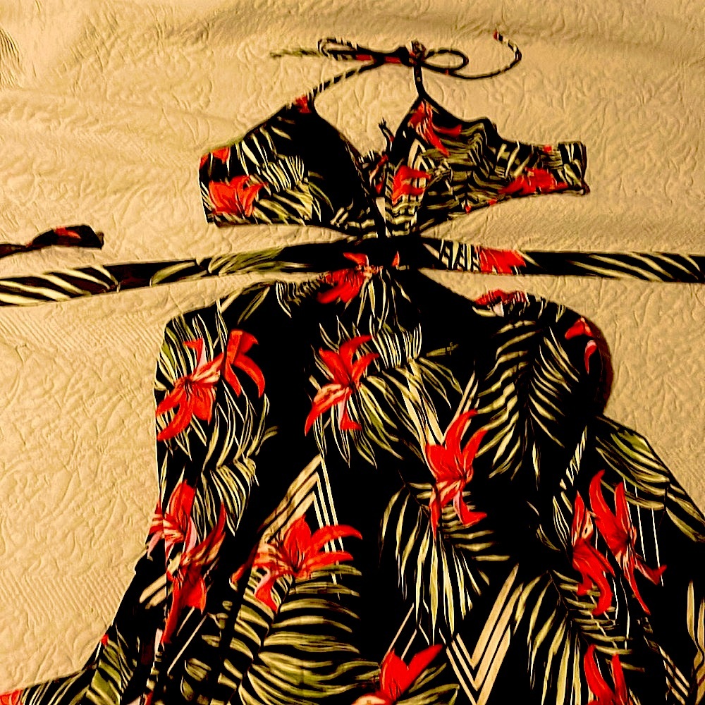 Halter maxi with cut outs ! Super cute and flirty. Great swimsuit coverup